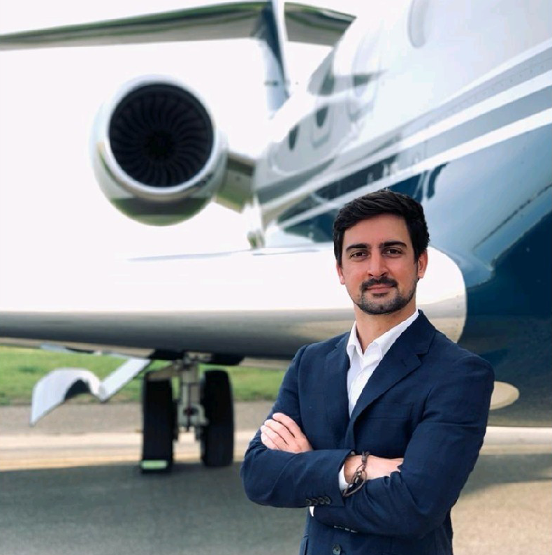 man standing with airplane